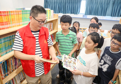 四川华蓥暑期图书馆有了导读员[4].jpg